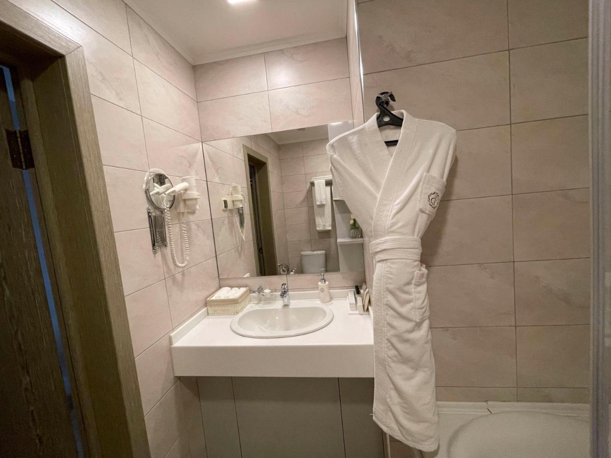 Grace Point Hotel Astana Bagian luar foto