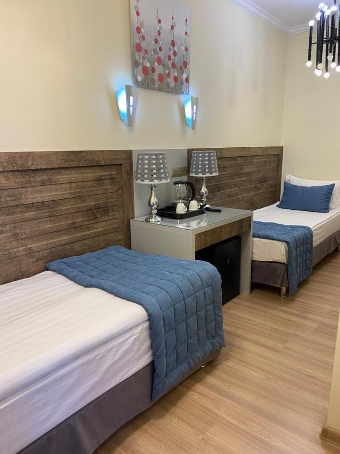 Grace Point Hotel Astana Bagian luar foto