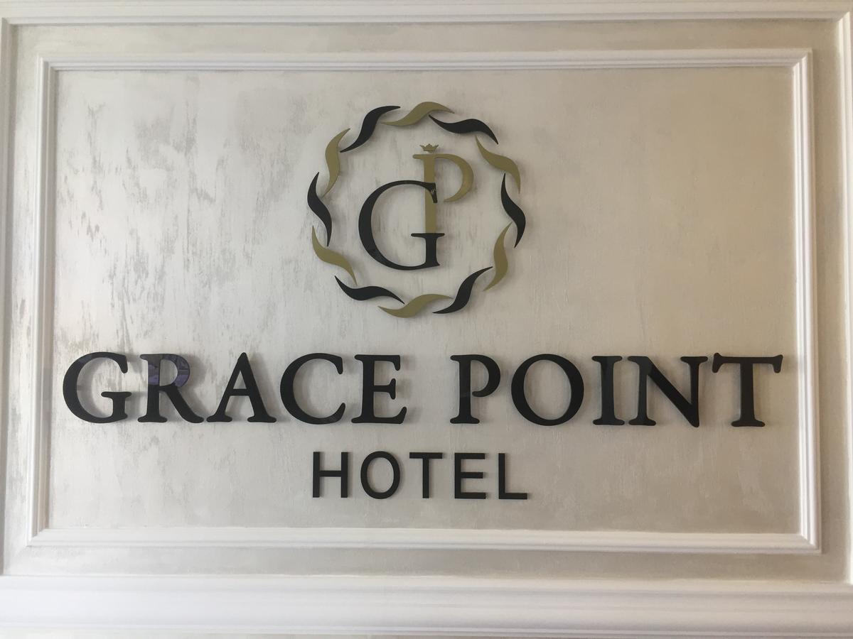 Grace Point Hotel Astana Bagian luar foto