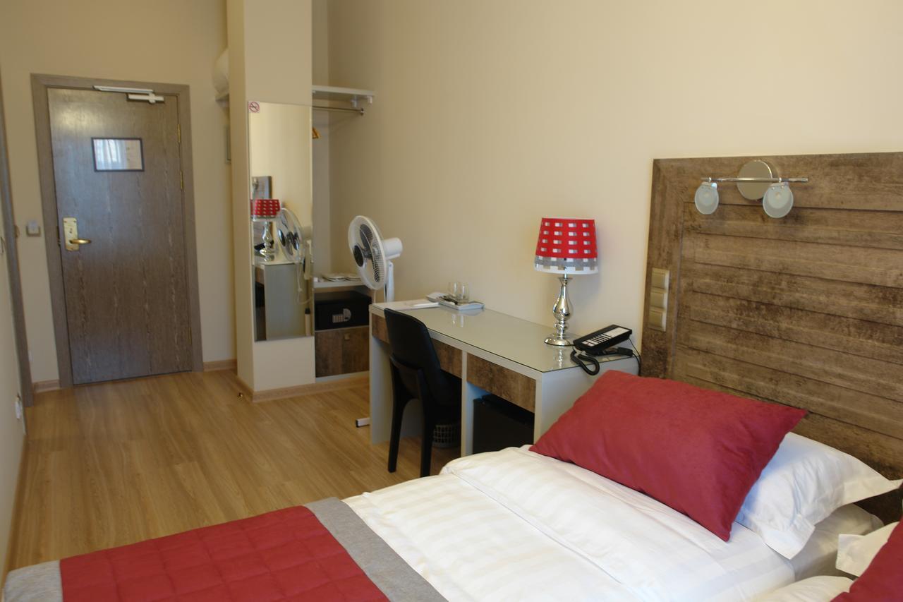 Grace Point Hotel Astana Bagian luar foto