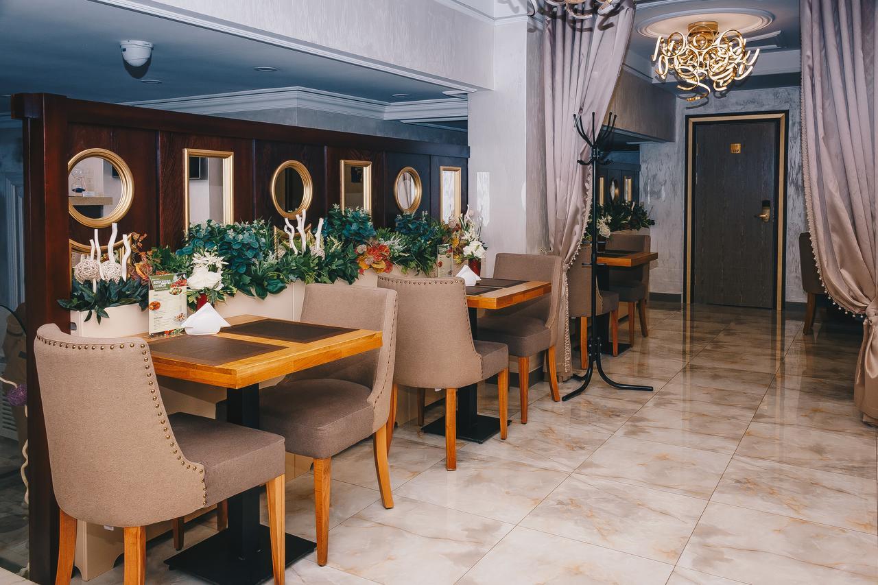 Grace Point Hotel Astana Bagian luar foto