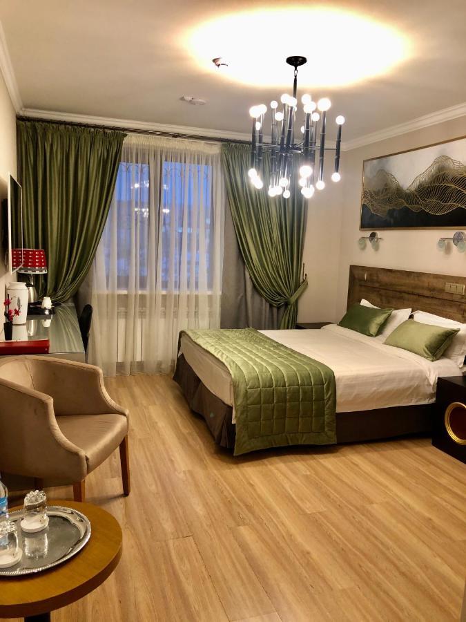 Grace Point Hotel Astana Bagian luar foto